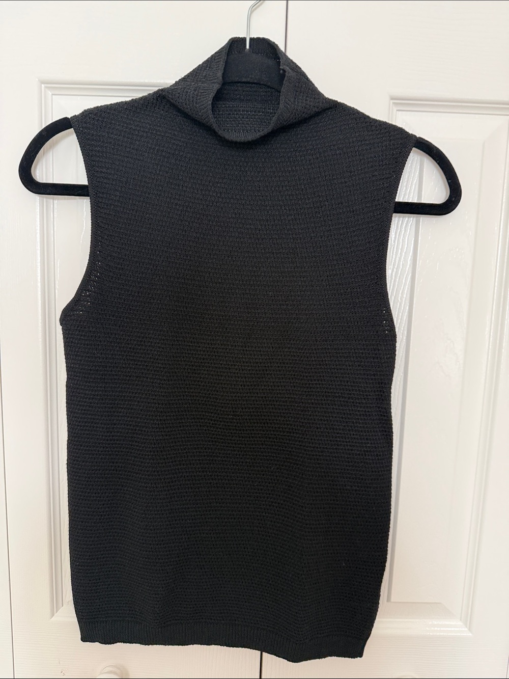 Black Sleeveless Turtleneck Knit Top